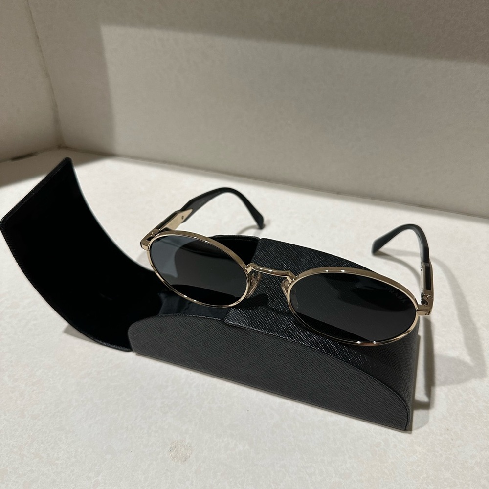 Prada Black and Gold Oval Sunglasses